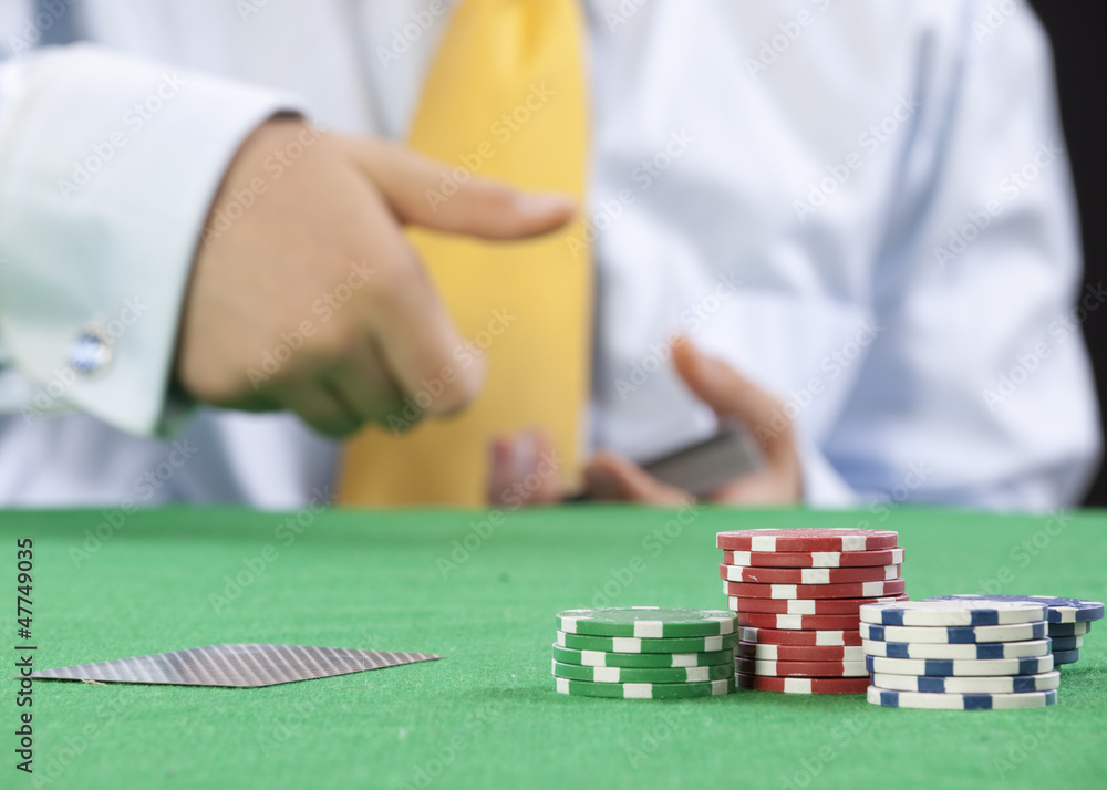 Naklejka premium poker player with a yellow tie serving cards