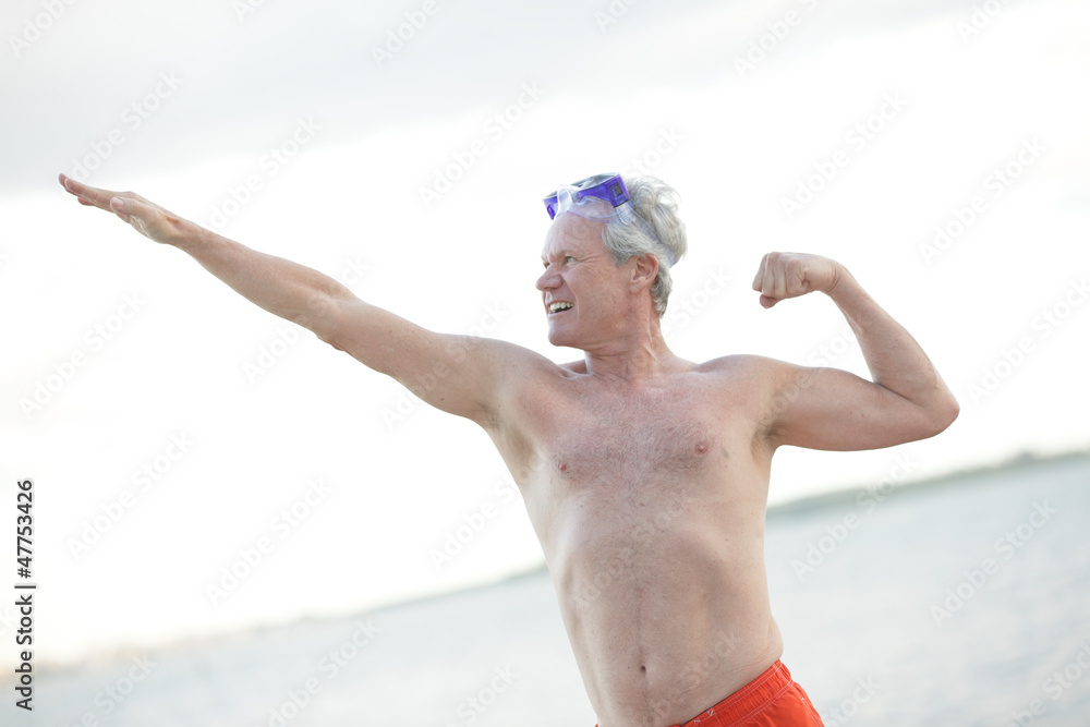 Mature man in a fitness pose