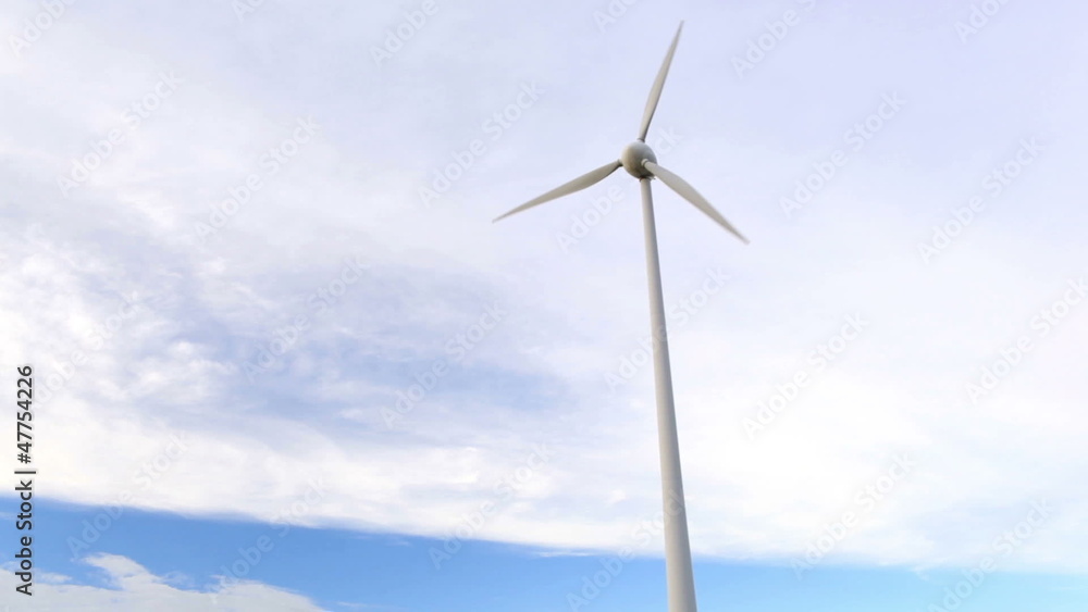 Wind turbine over the blue sky.