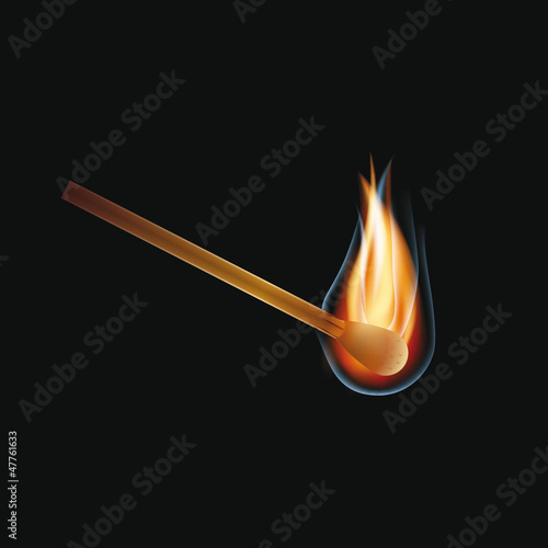 Burning match on a black background