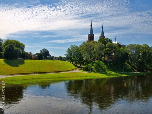 Obraz na płótnie Church in Anyksciai city and beautiful river Sventoji w salonie