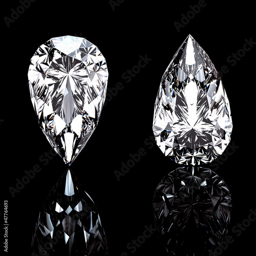 Jewelry gems on black background. Pear.