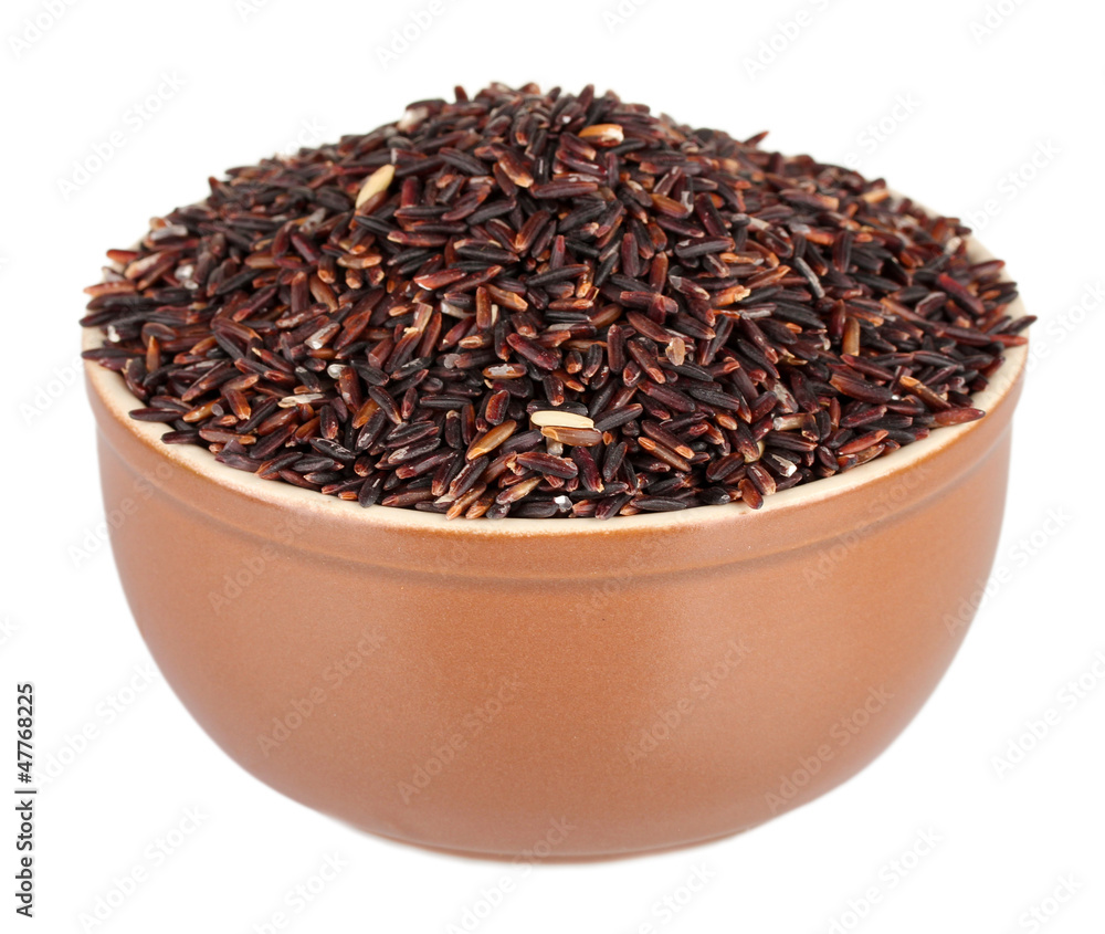 black rice in a brown plate , isolated on white black rice in a brown plate , isolated on white