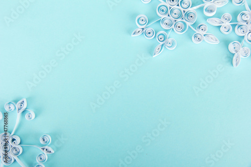 beautiful paper snowflakes, on blue background