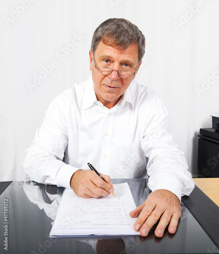 business man signing a contract