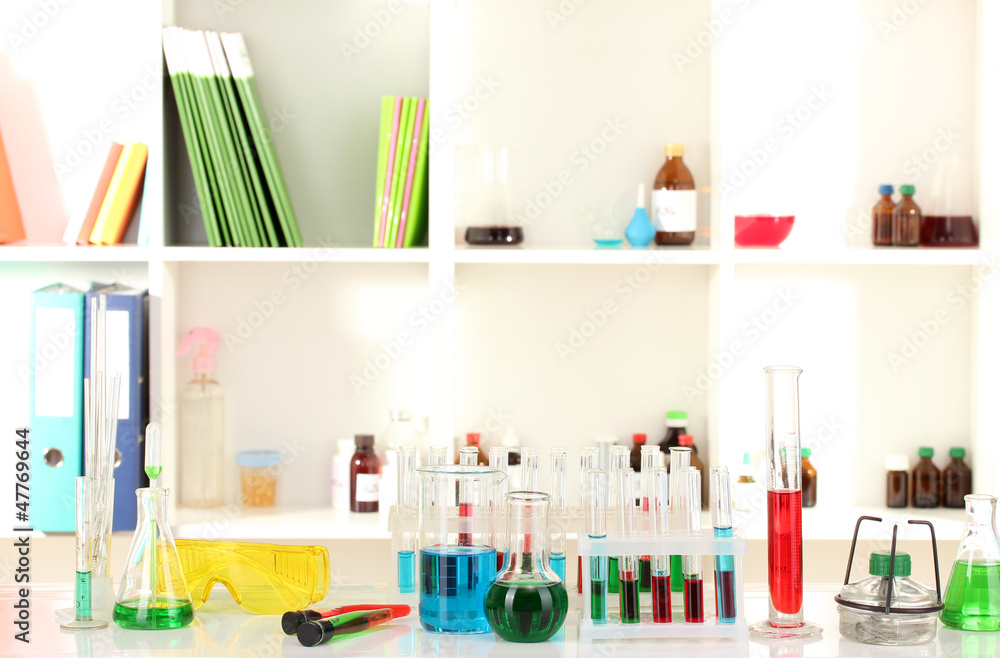 Obraz premium Different laboratory glassware with color liquid