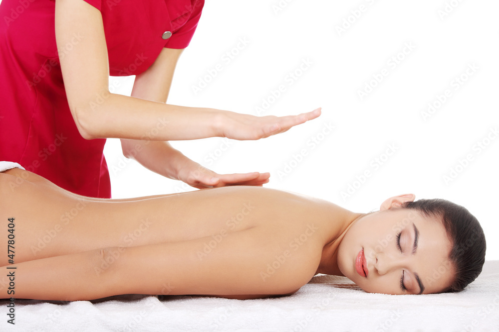 Pretty woman relaxing being massaged Pretty woman relaxing being massaged