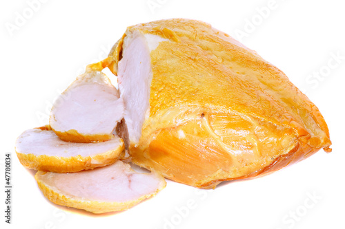 Slice on smoked chiken with knife . Isolated