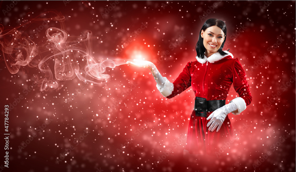 Fototapeta premium Portrait of girl wearing santa claus clothes