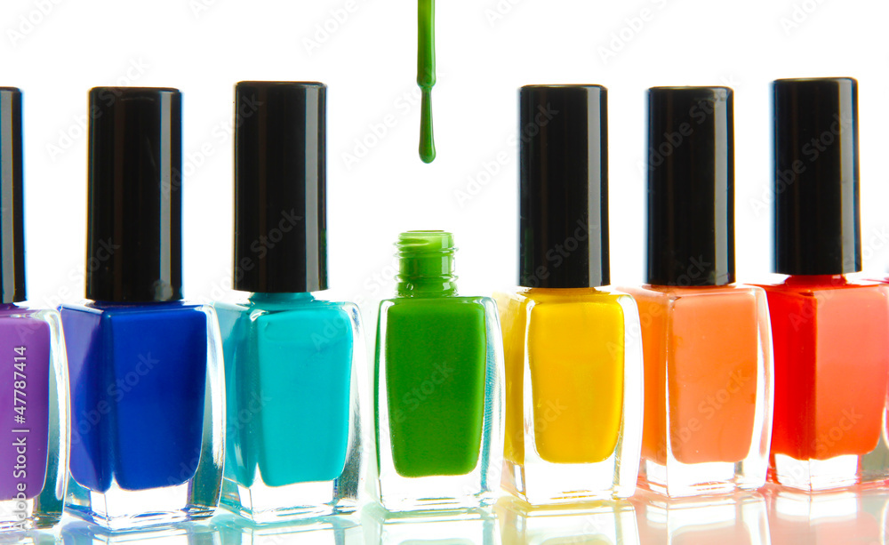 Group of bright nail polishes isolated on white Group of bright nail polishes isolated on white