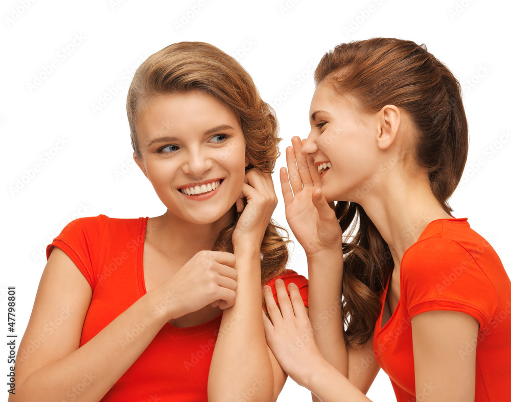 two talking teenage girls in red t-shirts two talking teenage girls in red t-shirts
