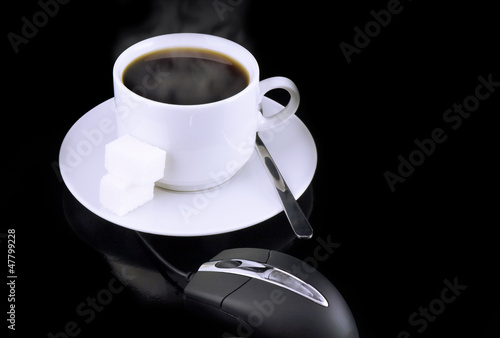 Cup of coffee  mouse on a black.
