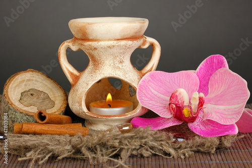 Aromatherapy lamp on grey background