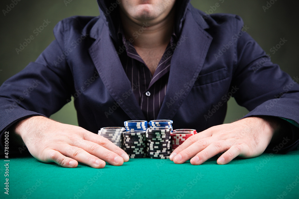 Poker player on black background Poker player on black background