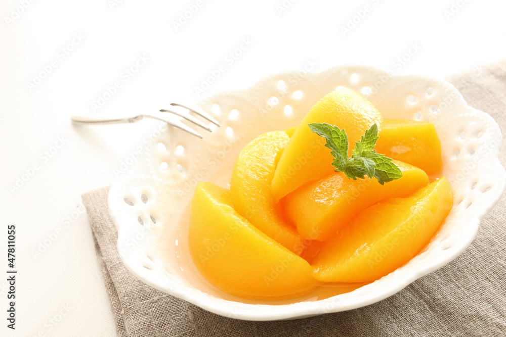 freshness peach on bowl with mint for gourmet dessert freshness peach on bowl with mint for gourmet dessert