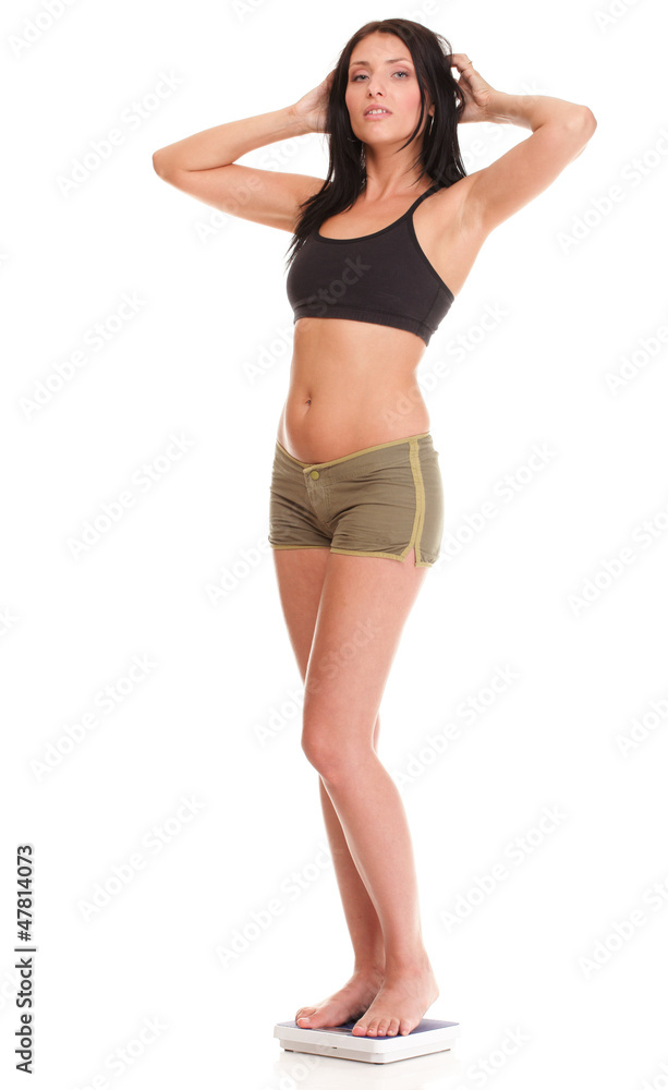 Weight loss woman on scale happy Weight loss woman on scale happy