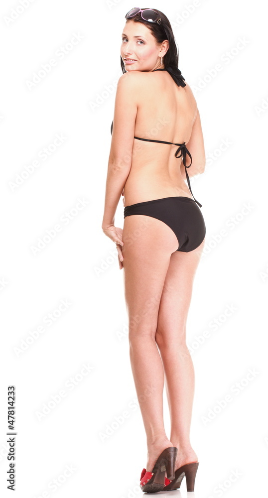 Portrait of sexy brunette in brown bikini isolated Portrait of sexy brunette in brown bikini isolated