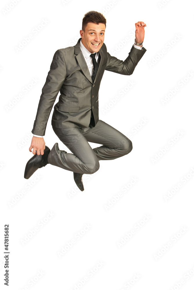 Cheerful business man jumping