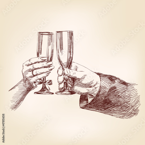 Two hands with champagne glasses
