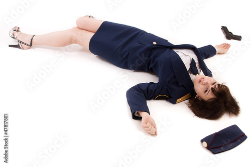 Woman officer lying on a floor