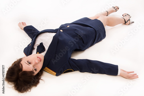 Woman officer lying on a floor