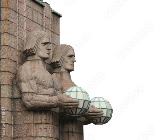 Statues at the railway station in Helsinki.