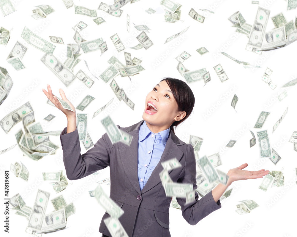Business woman happy under money rain Business woman happy under money rain