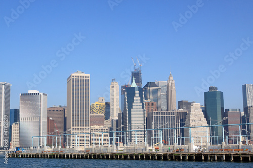 Lower Manhattan Skyline and Skyscrapers on a Clear Blue Sky