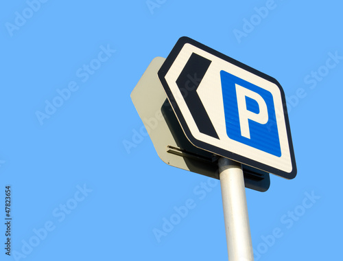 car parking sign on blue sky background