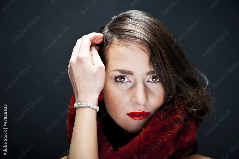 Beautiful woman on black background with jewelty Beautiful woman on black background with jewelty