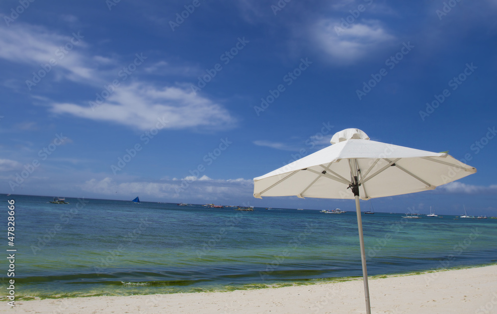 tropical beach seascape with blue sky
