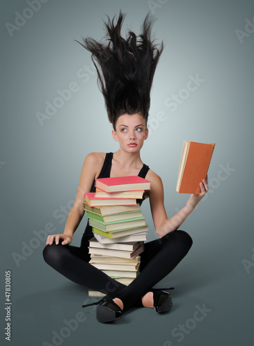 Принти на полотні Sexy young woman reading a book, concept of fantasy