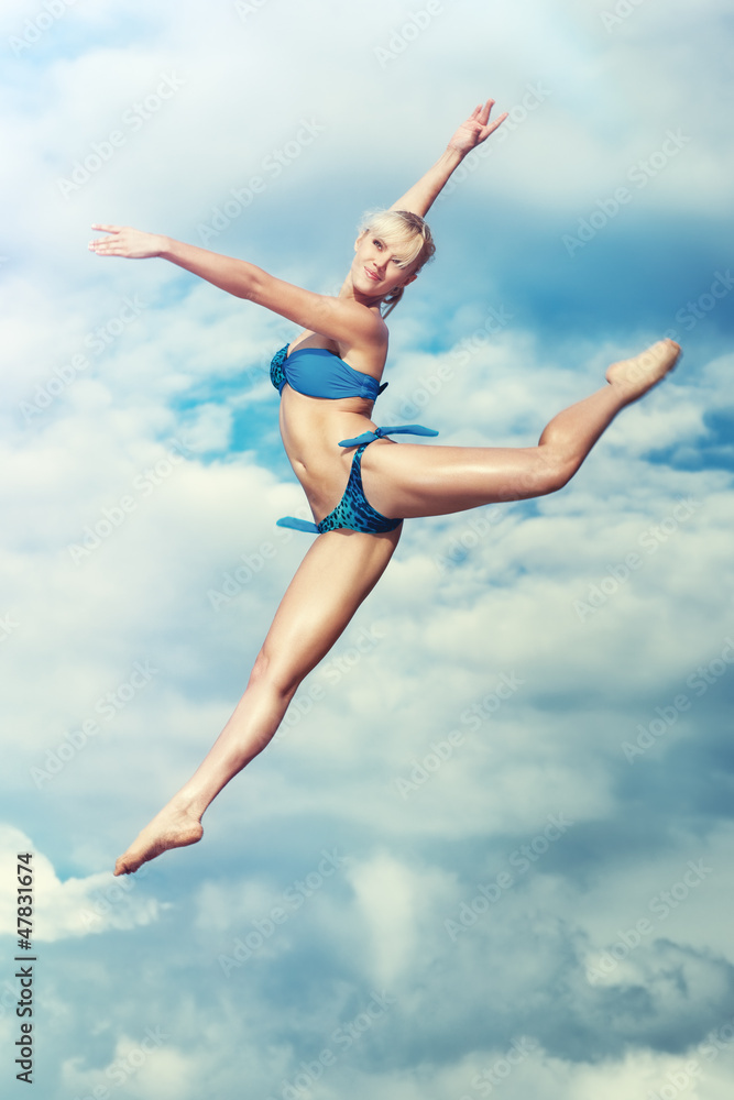 Young slim woman jumping Young slim woman jumping