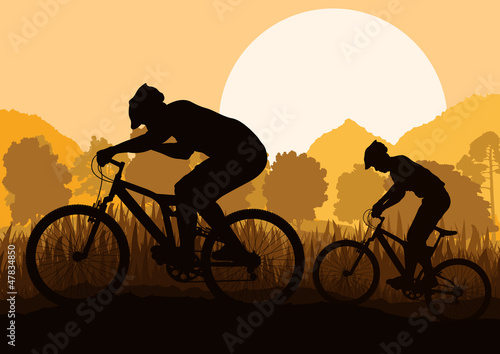 Mountain bike riders in wild forest mountain nature landscape ve