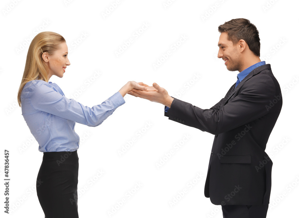 man and woman showing something on the palms man and woman showing something on the palms