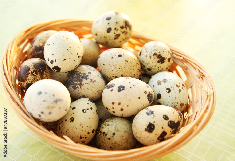 quail eggs in a basket