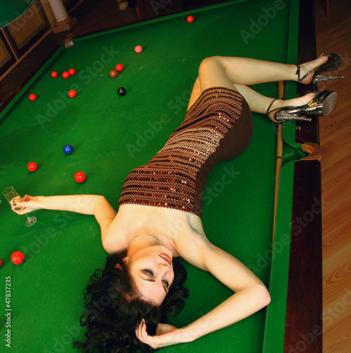 young girl in snooker bar photo