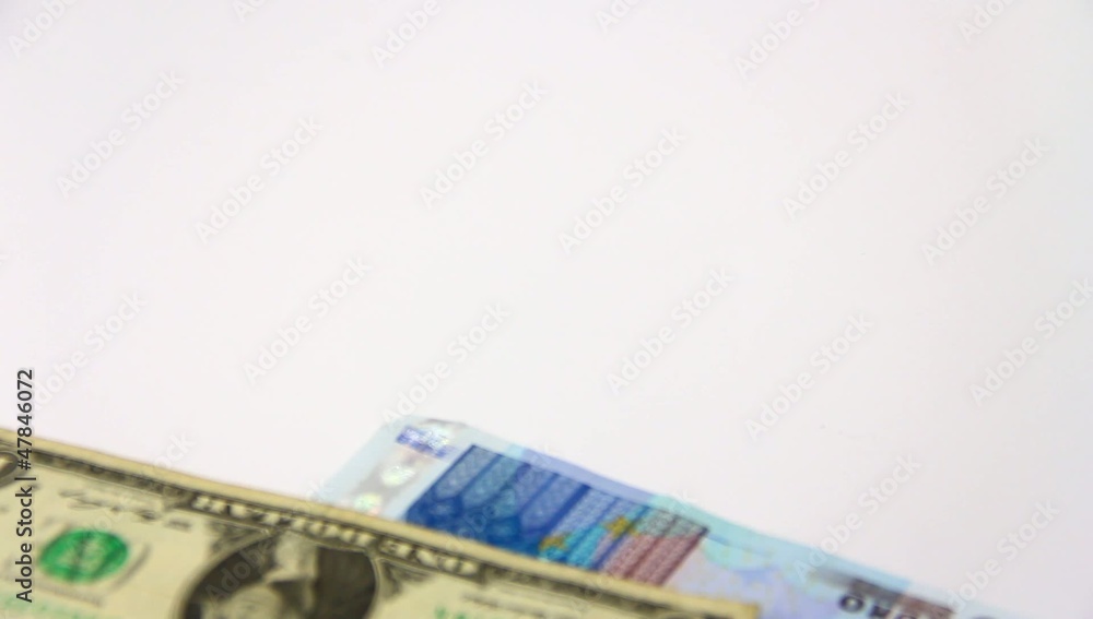 International paper money falling on white background. International paper money falling on white background.