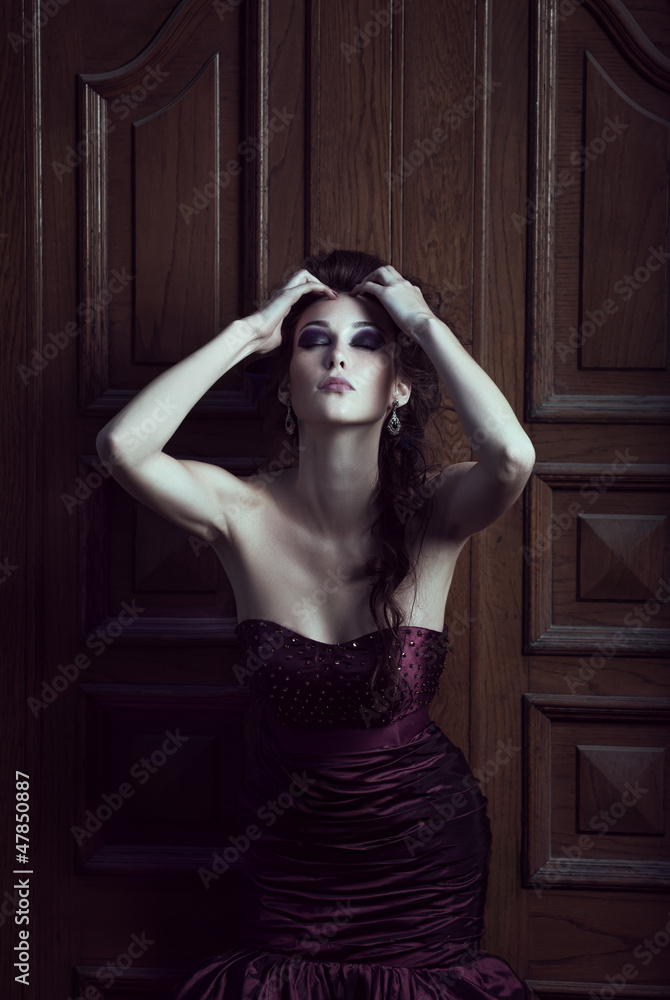 Beautiful woman in violet dress Beautiful woman in violet dress