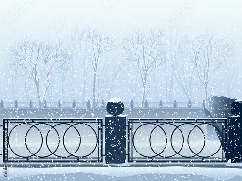 Snowfall in park with the river canal and bridge.