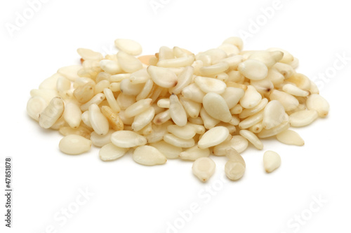white sesame seeds on a white background