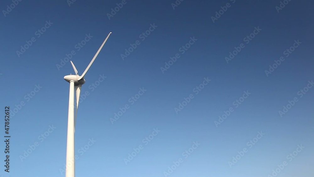 Close up of wind turbine with a clear blue sky Close up of wind turbine with a clear blue sky