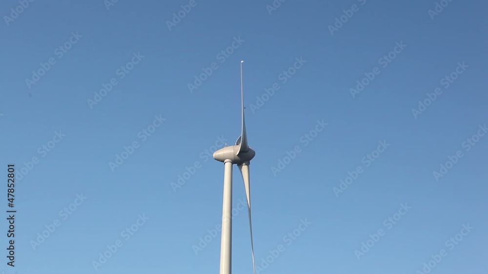 Close up of wind turbine with a clear blue sky Close up of wind turbine with a clear blue sky