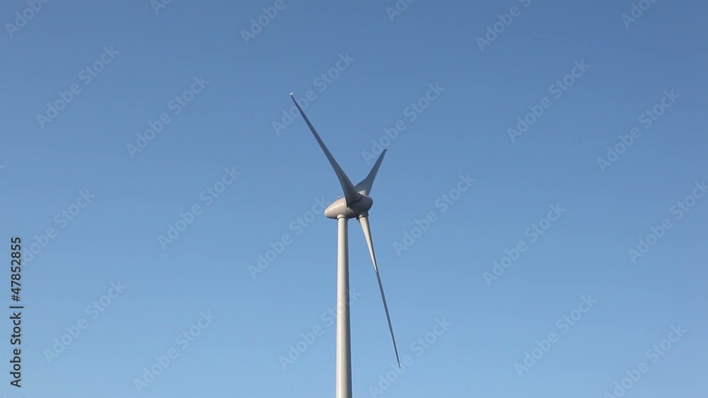 Close up of wind turbine with a clear blue sky Close up of wind turbine with a clear blue sky