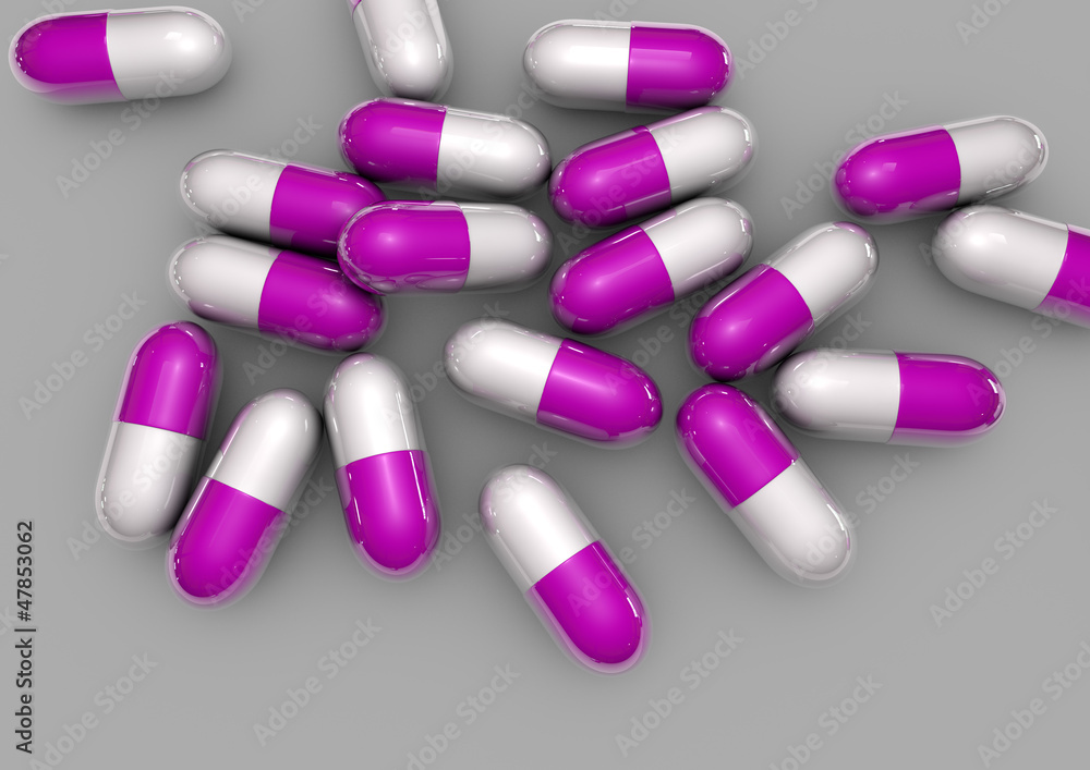 purple pills isolated on grey purple pills isolated on grey
