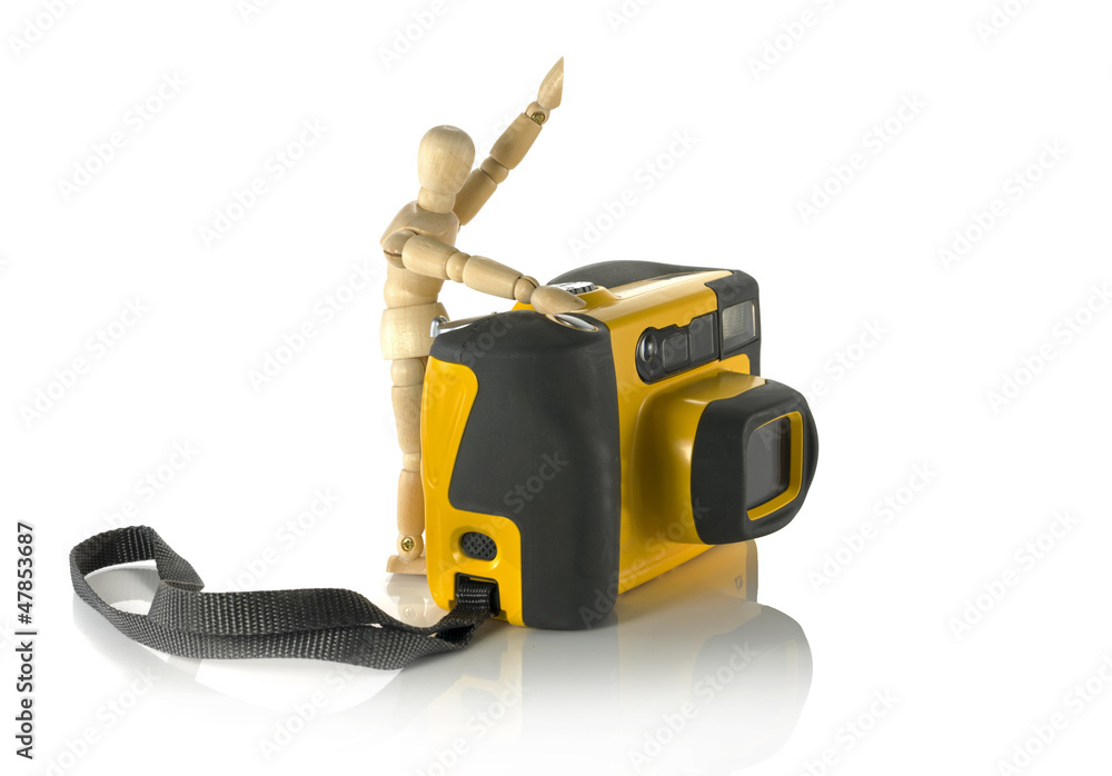 Fototapeta premium wooden puppet with camera