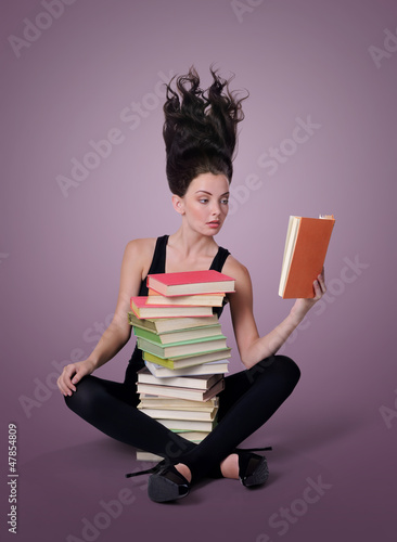 фотографія Sexy young woman reading a book, learning concept