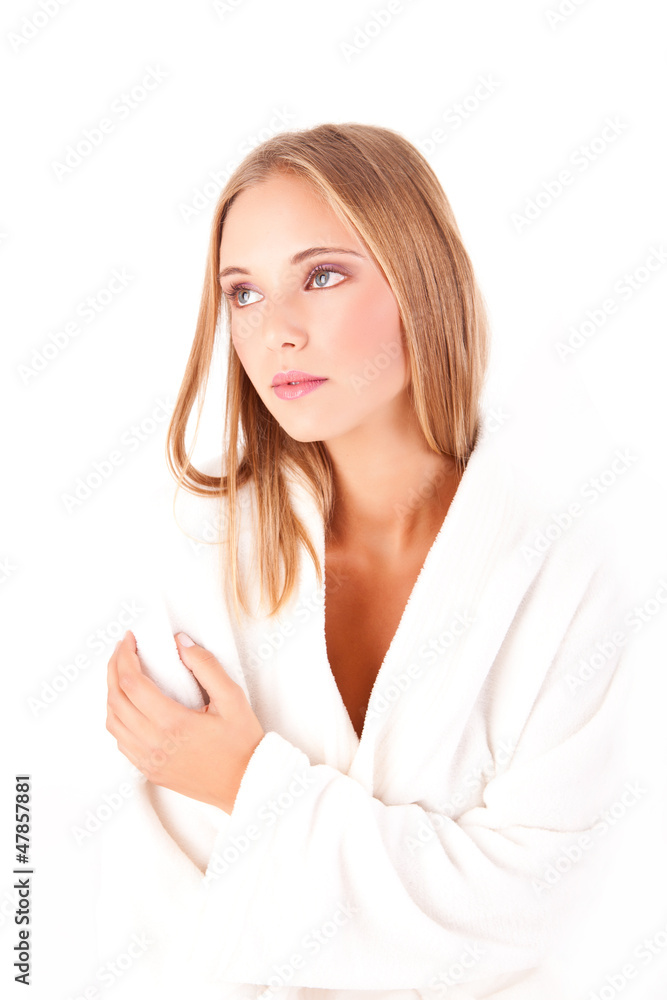 Portrait of a blonde woman in a white spa bath robe Portrait of a blonde woman in a white spa bath robe