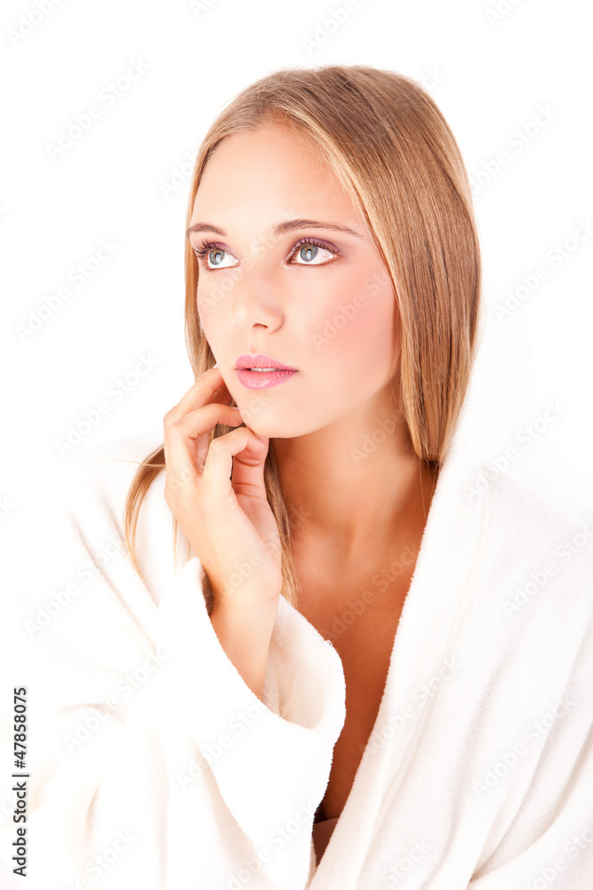 Portrait of a blonde woman in a white spa bath robe Portrait of a blonde woman in a white spa bath robe
