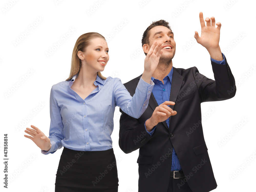 man and woman working with something imaginary man and woman working with something imaginary